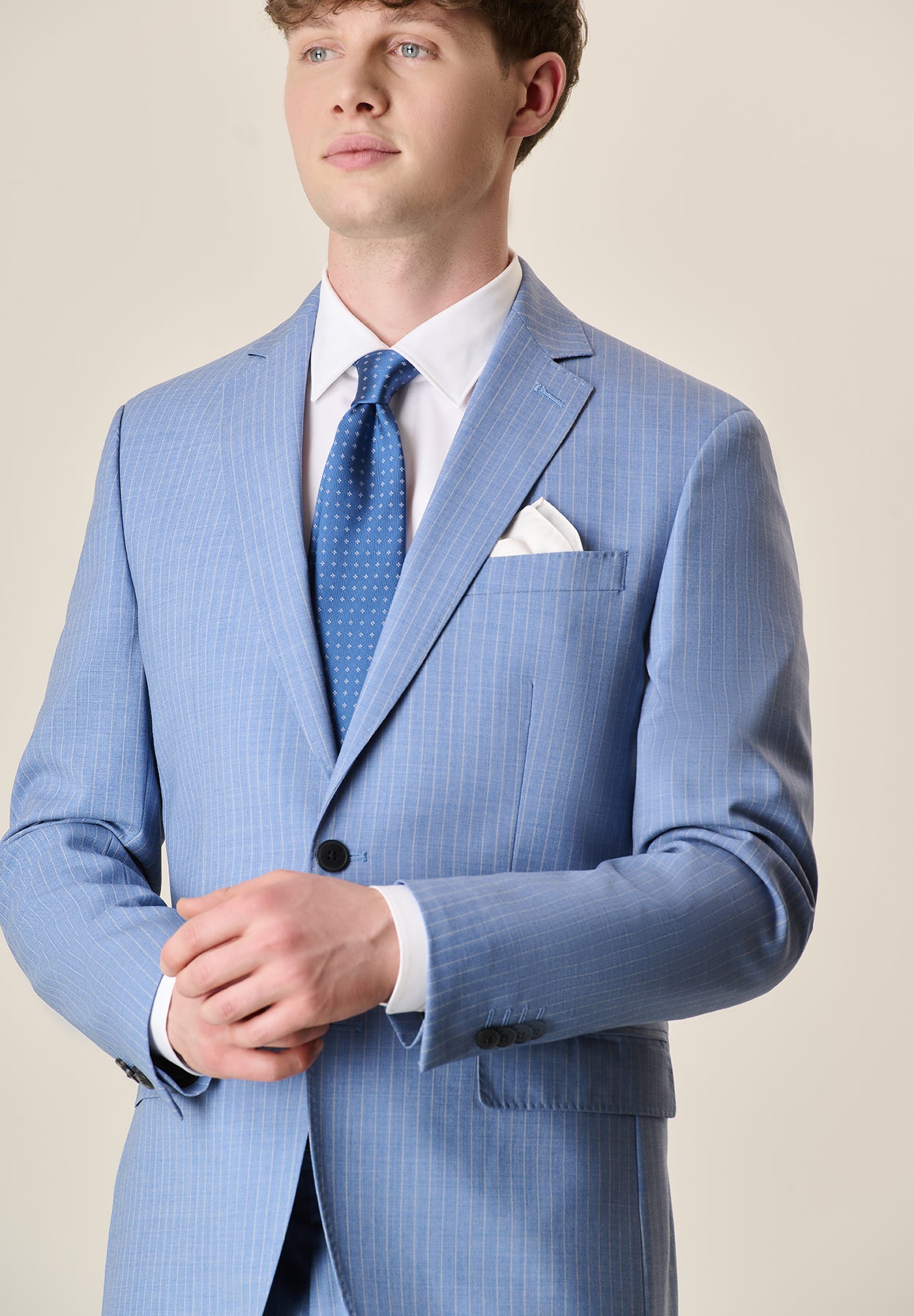 Custom fit light blue pinstriped virgin wool suit