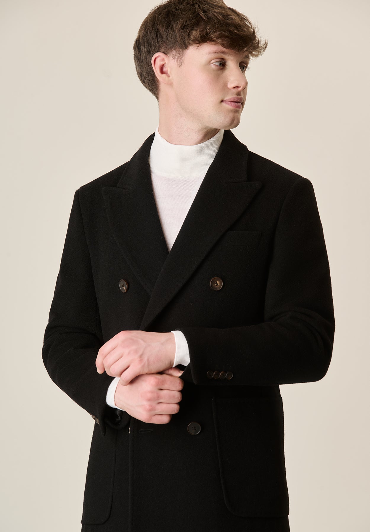 Cappotto nero doppiopetto lana con martingala Angelico