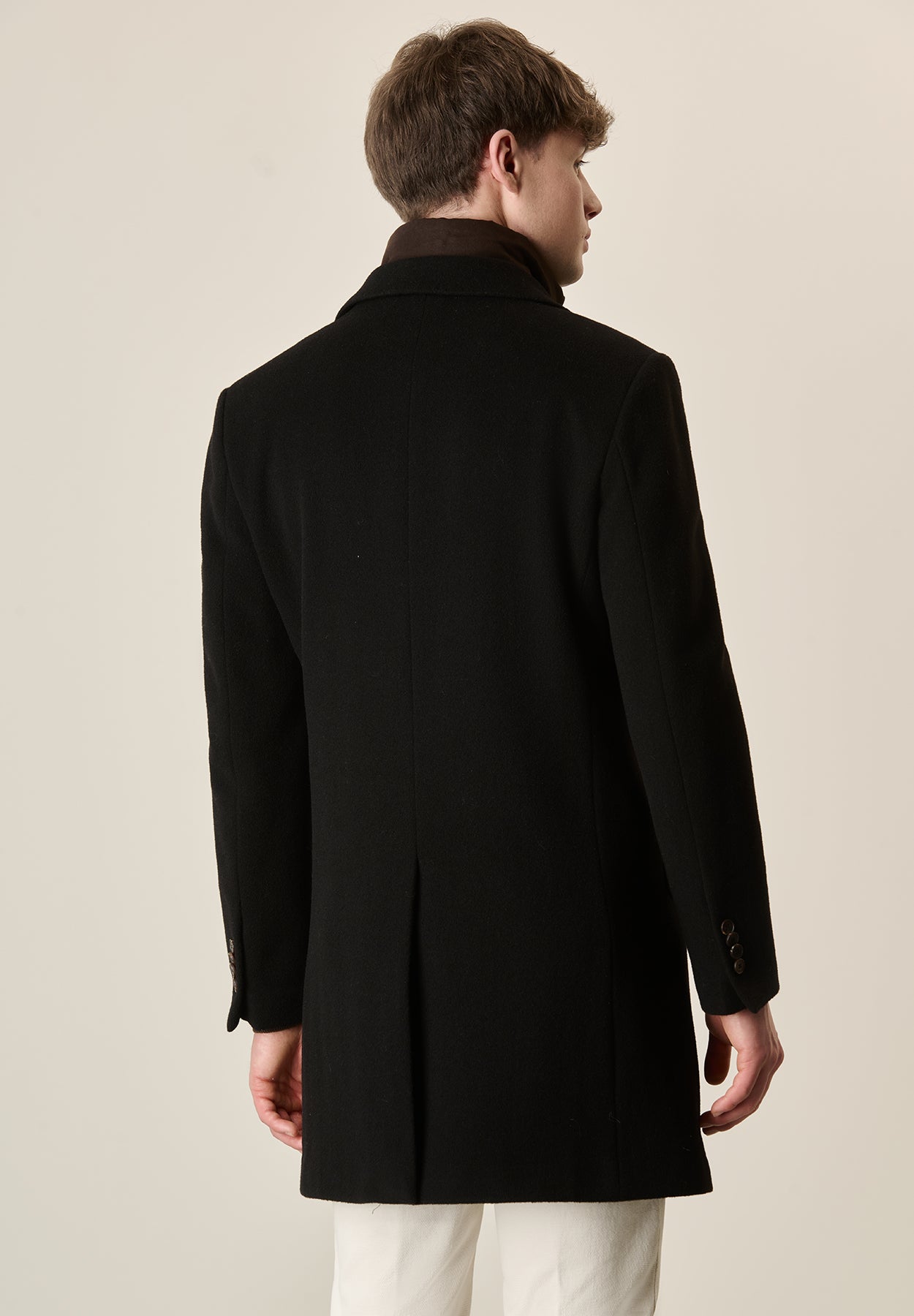 Cappotto nero con fintino lana