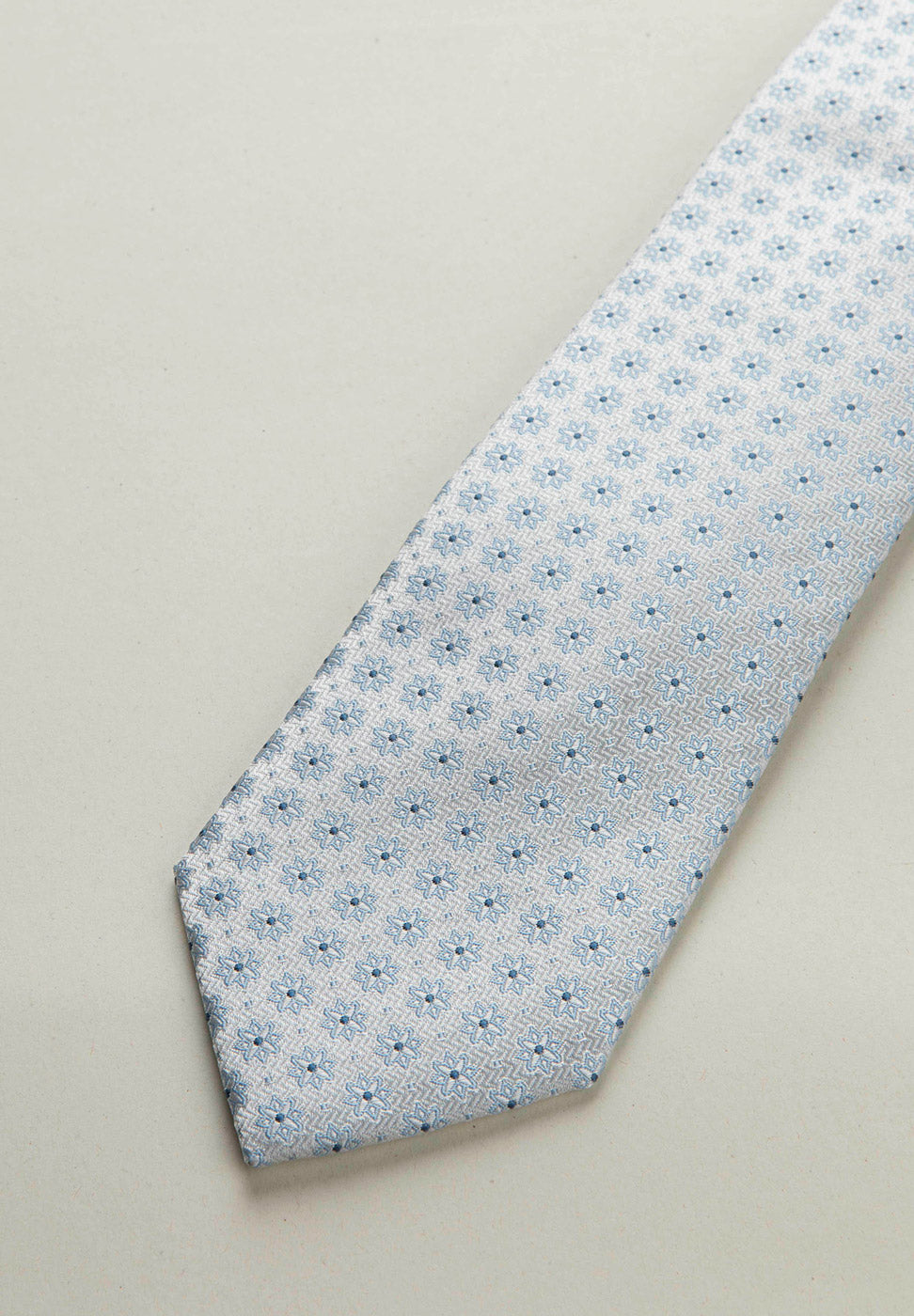 Cravatta grigio chiaro fantasia azzurra seta