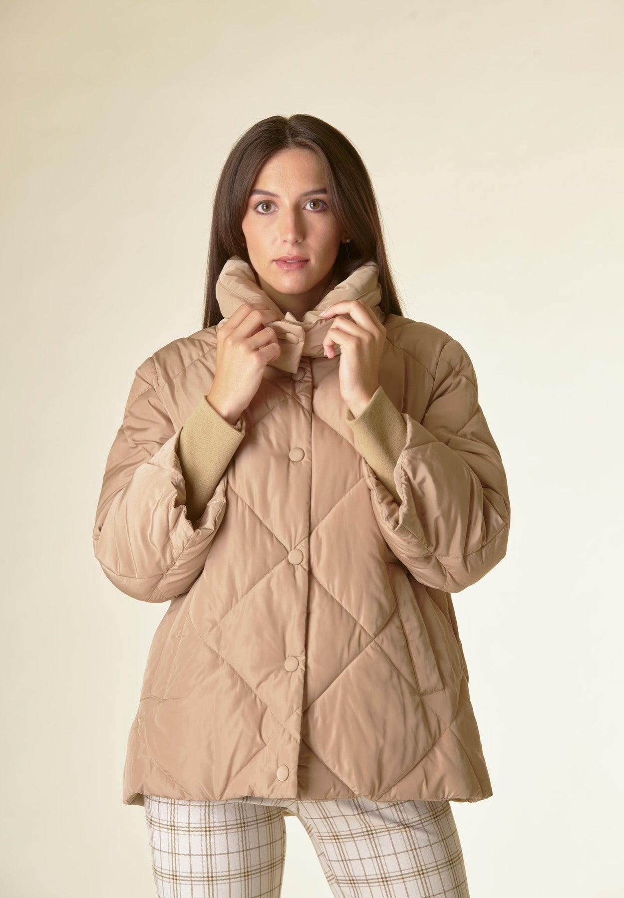 Piumino beige trapuntato