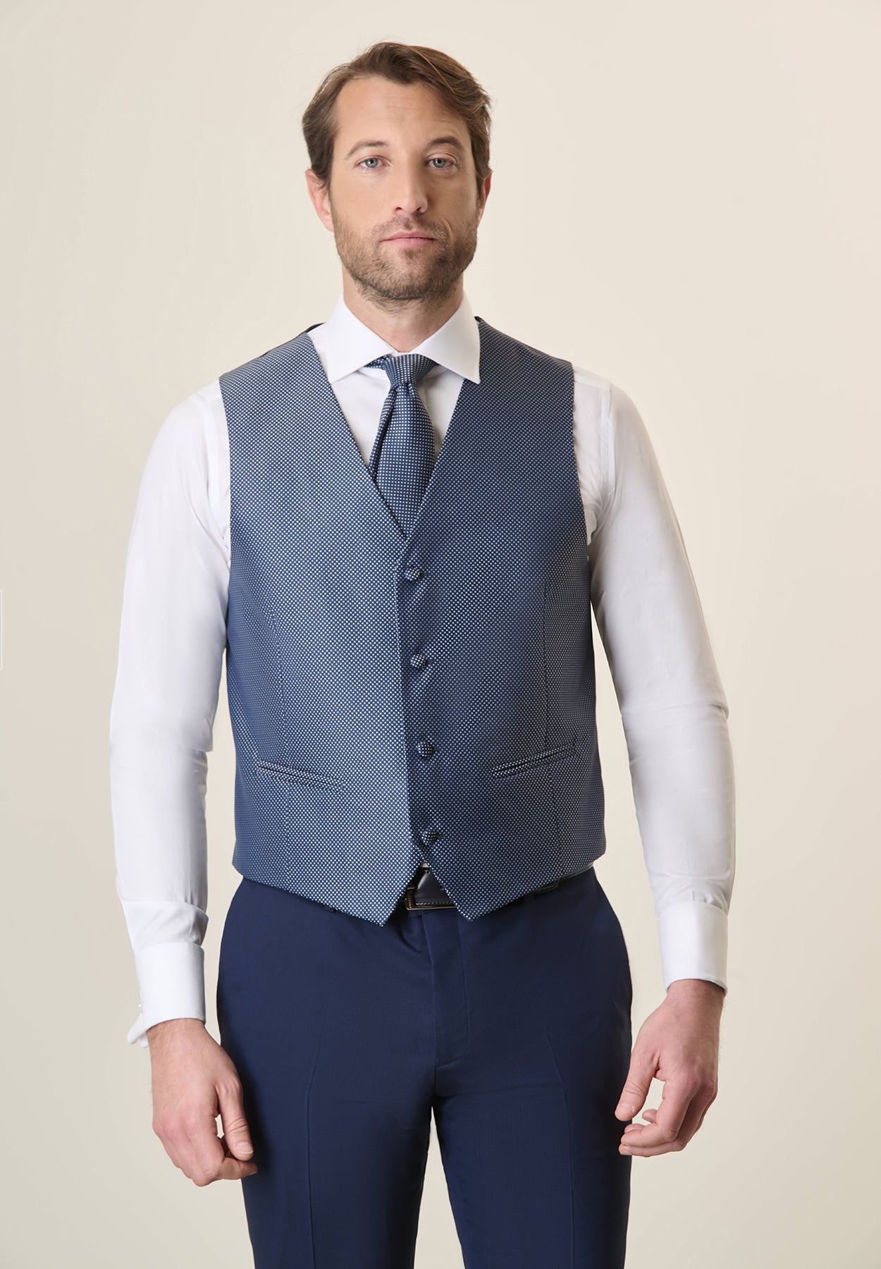 Blue ceremony vest with white micro-design