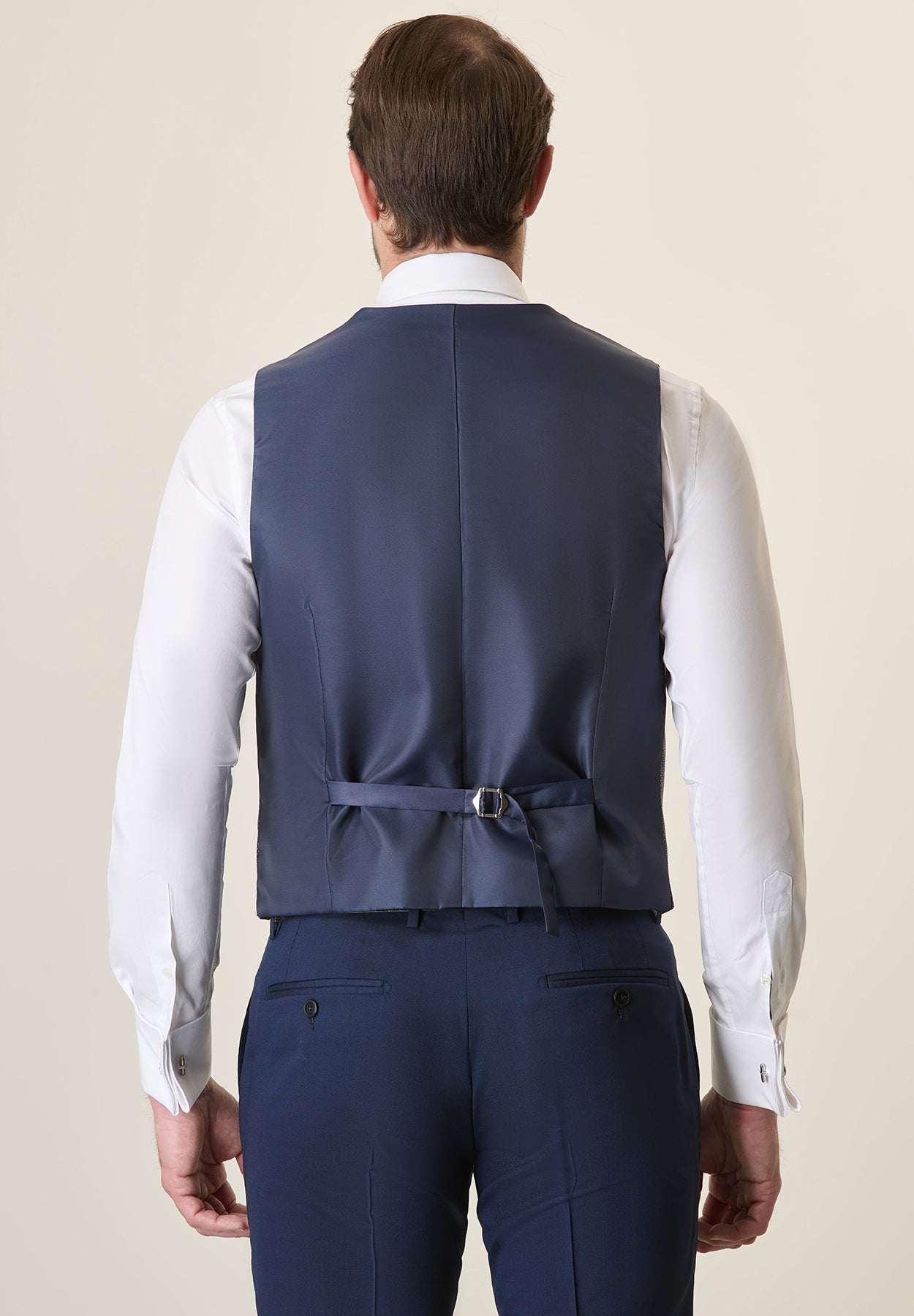 Blue ceremony vest with white micro-design