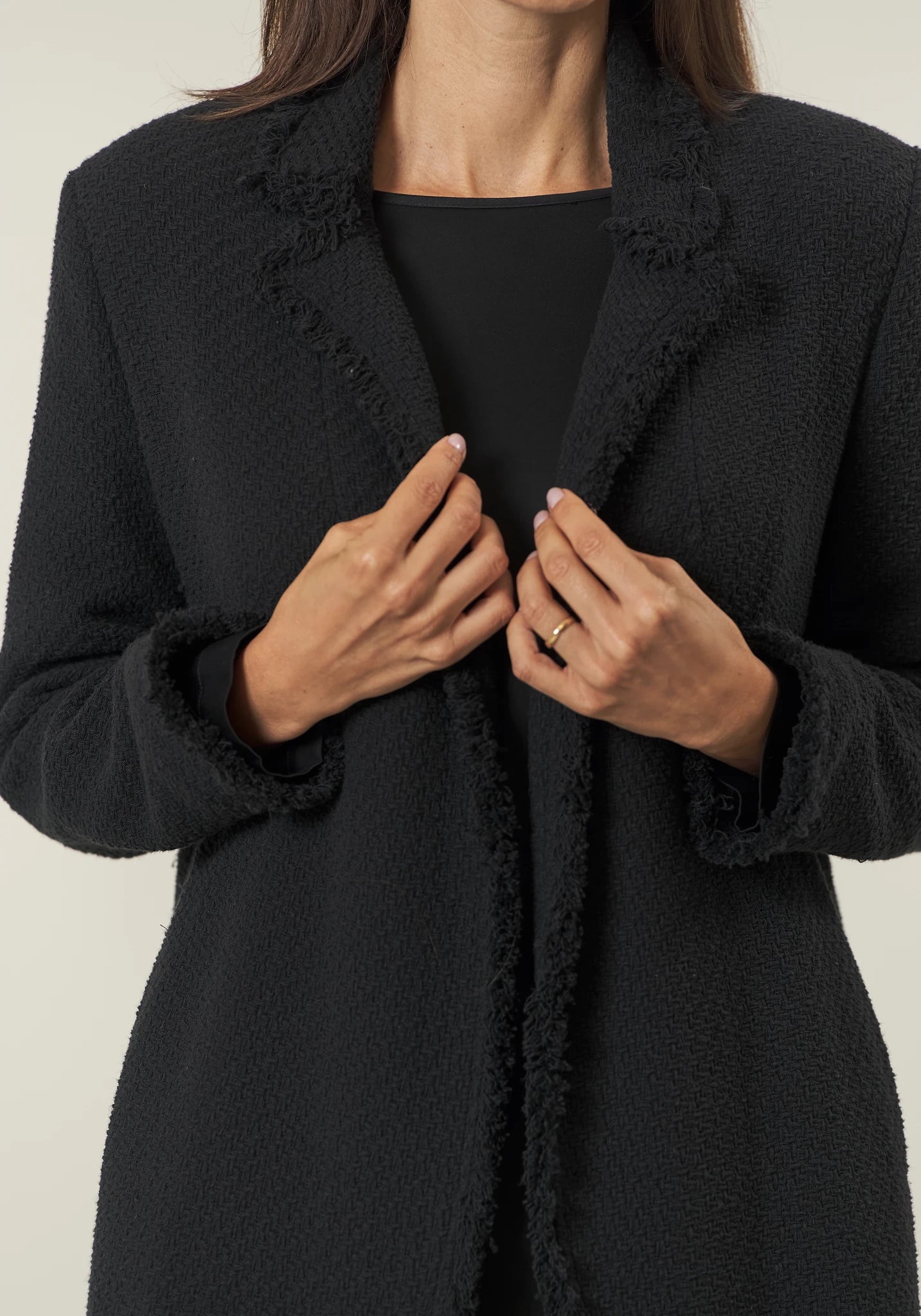 Long black jacket with braid and fringes open