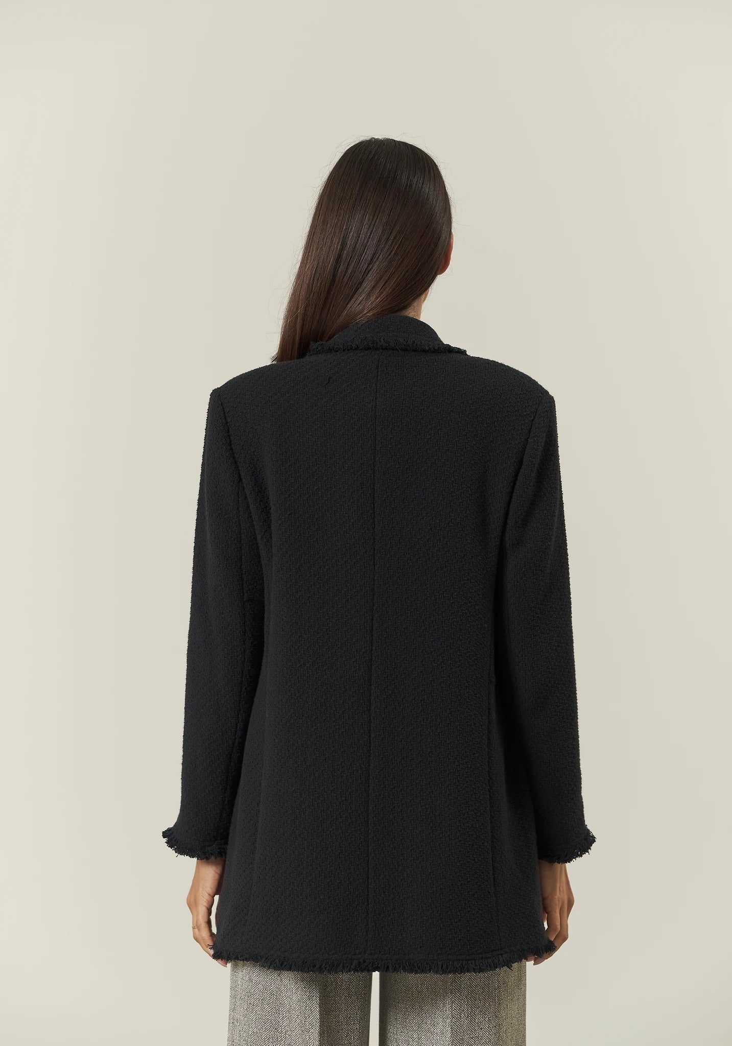 Long black jacket with braid and fringes open
