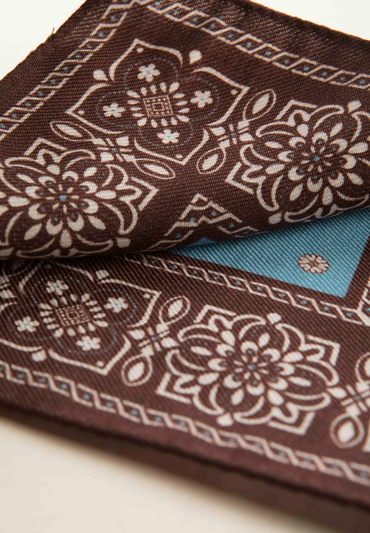 Pochette moro celeste fantasia fiorata lana-Angelico