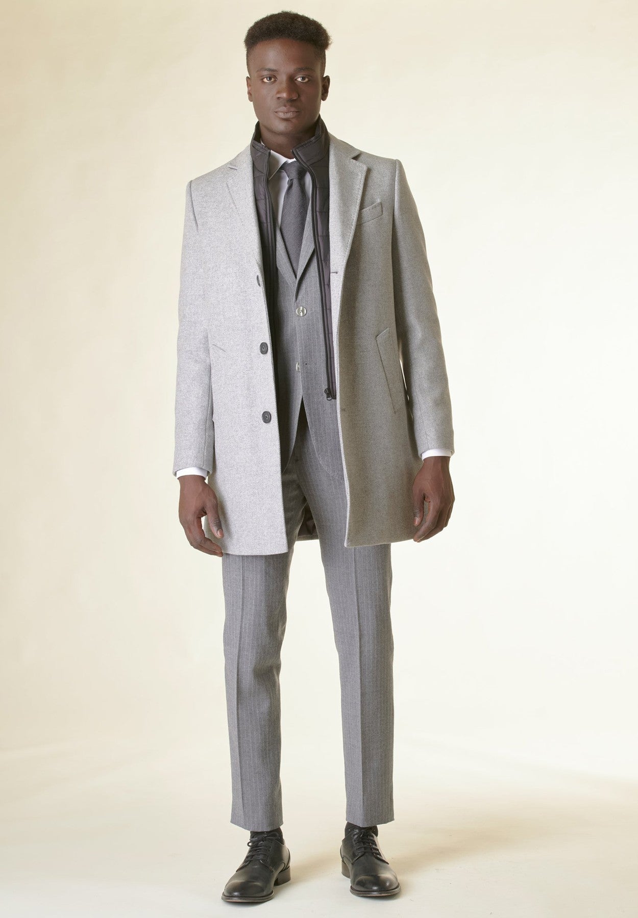Cappotto grigio melange lana