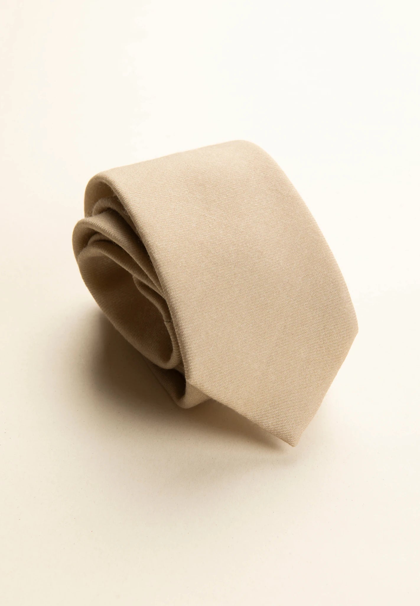 Cravatta lana beige unita-Angelico