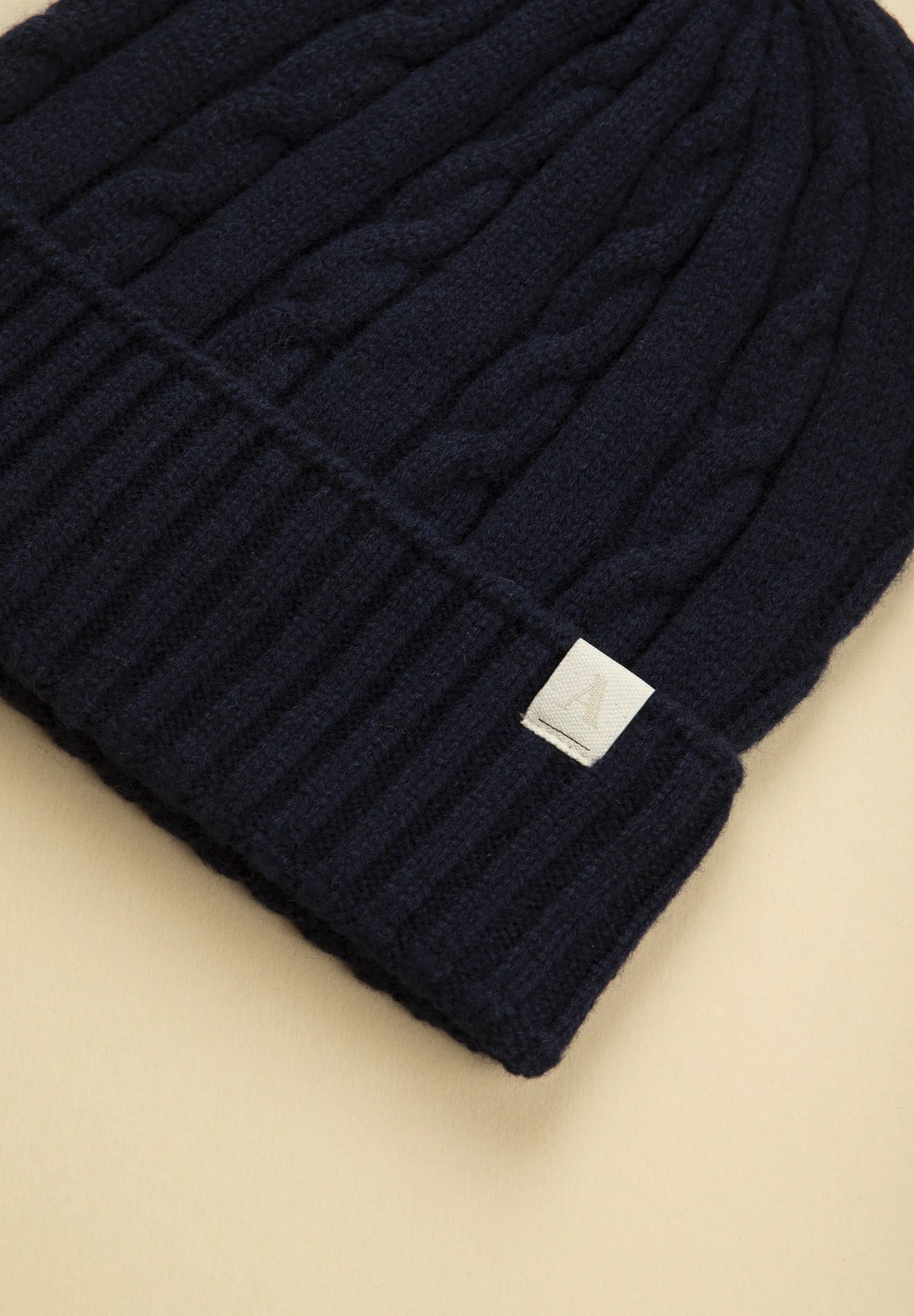 Berretto blu lana treccia