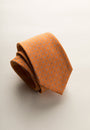 Silk flower patterned orange tie