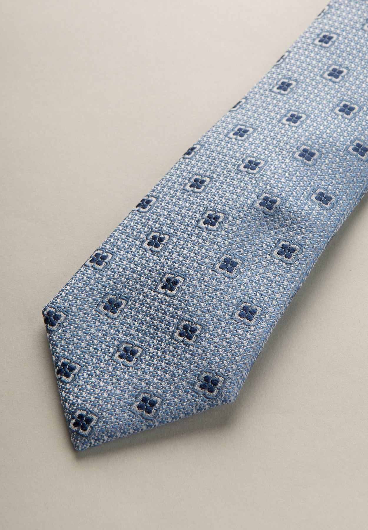 Cravatta azzurra armatura fantasia fiori seta cotone