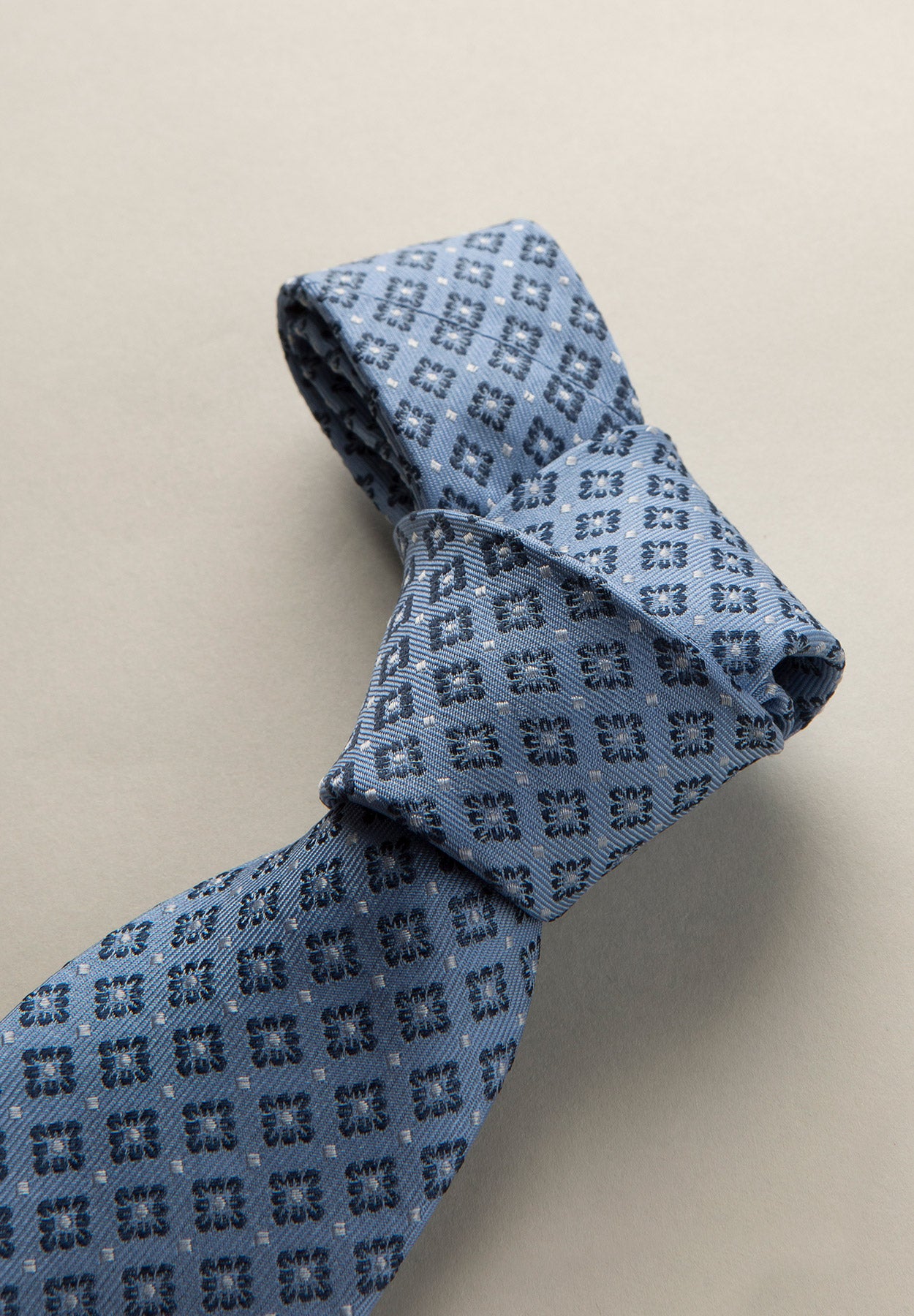 Tie light blue patterned rhombus and flowers silk