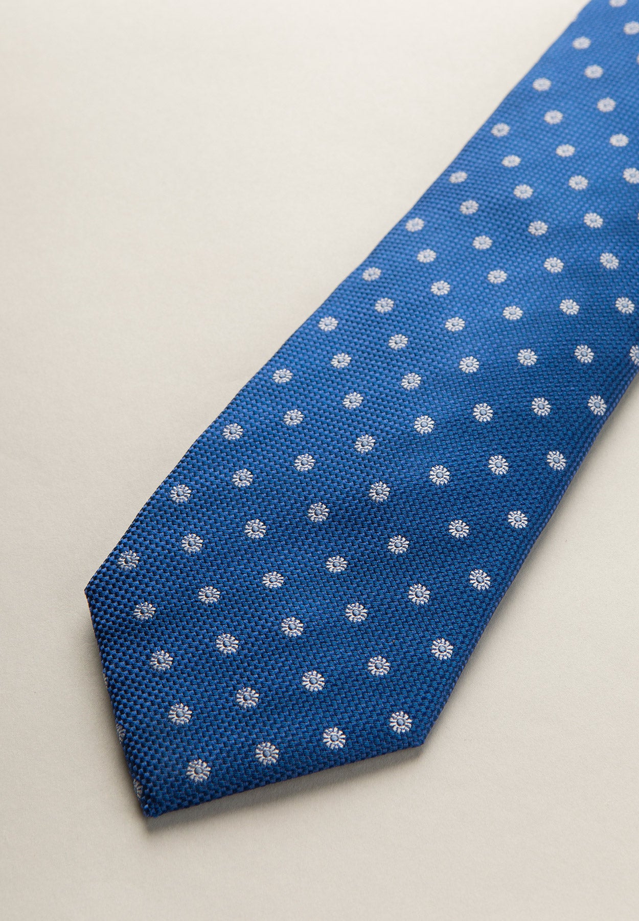 Navy blue tie daisy patterned silk