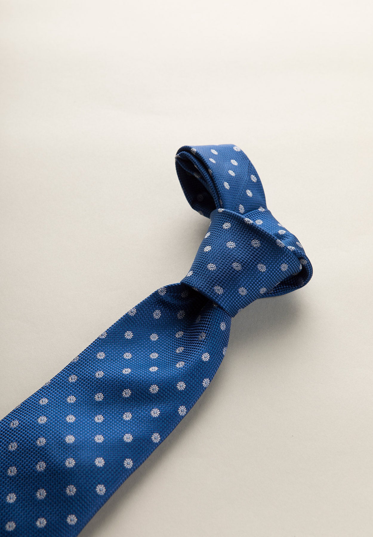 Navy blue tie daisy patterned silk
