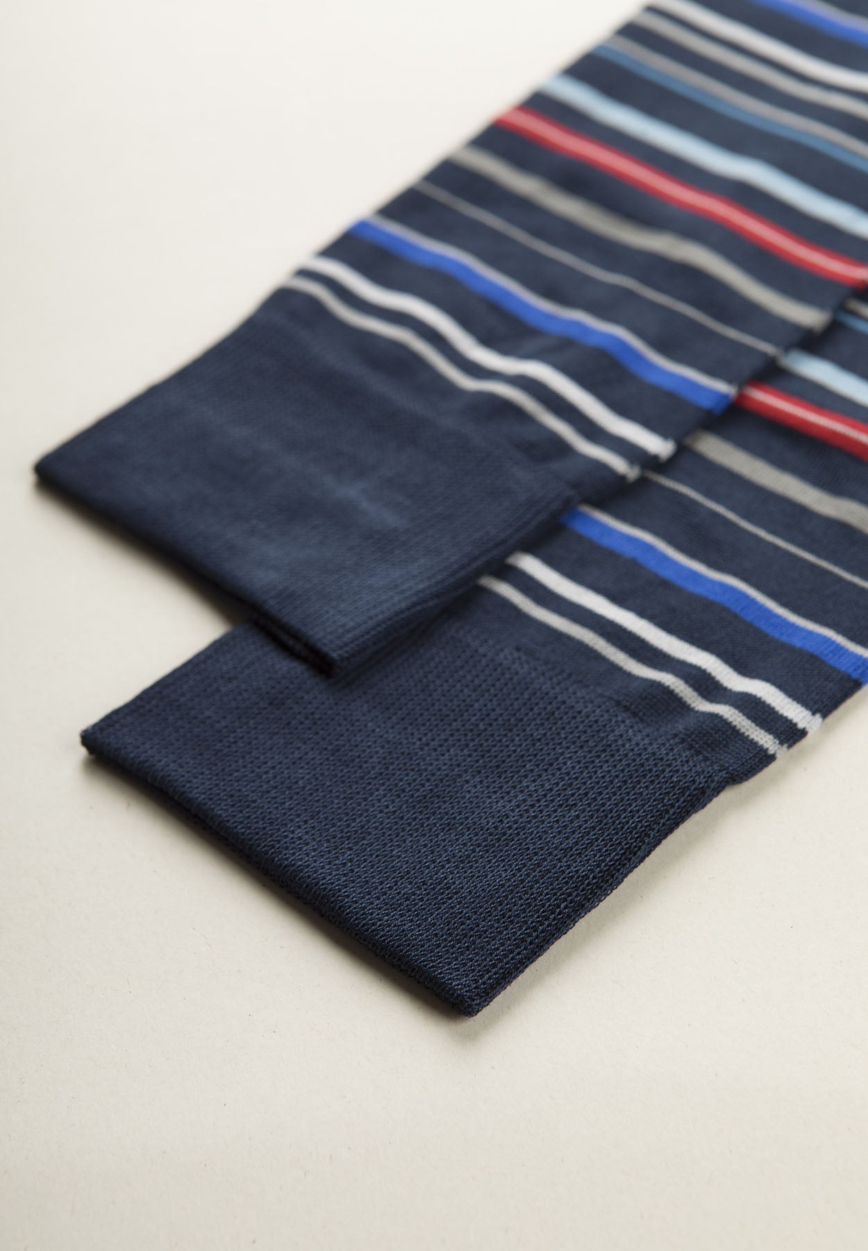 Navy blue sock with colored stripes and stretch cotton