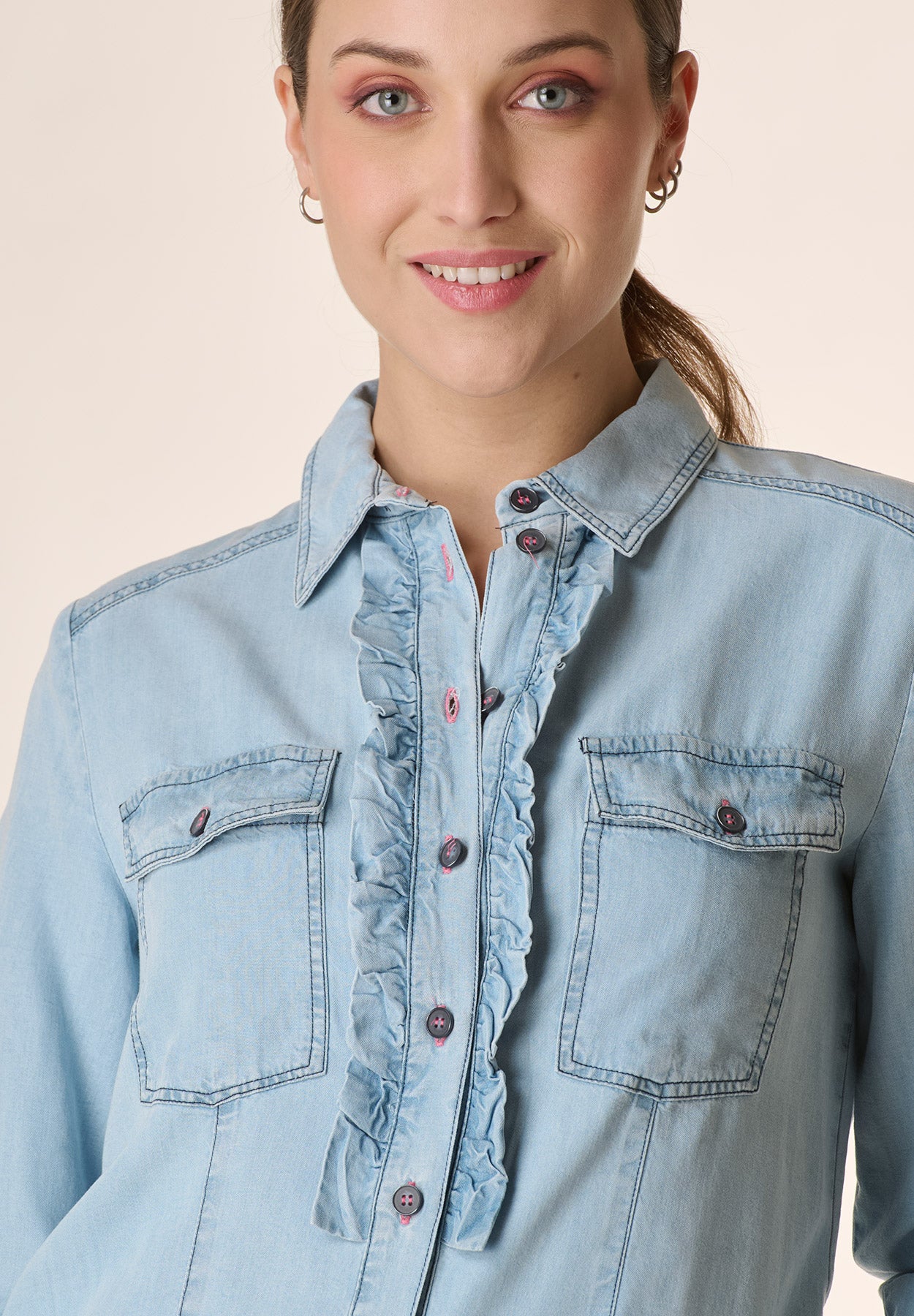 Light denim shirt with pockets and rouche