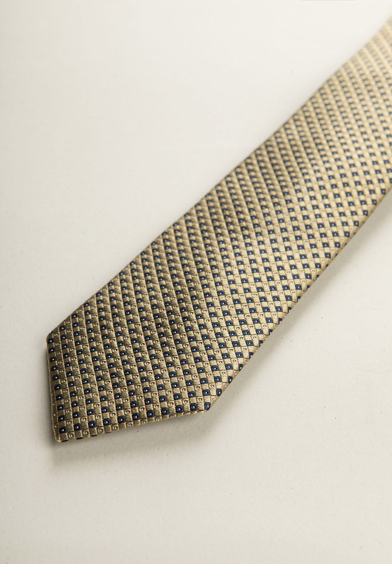 Ochre tie with blue micro design silk