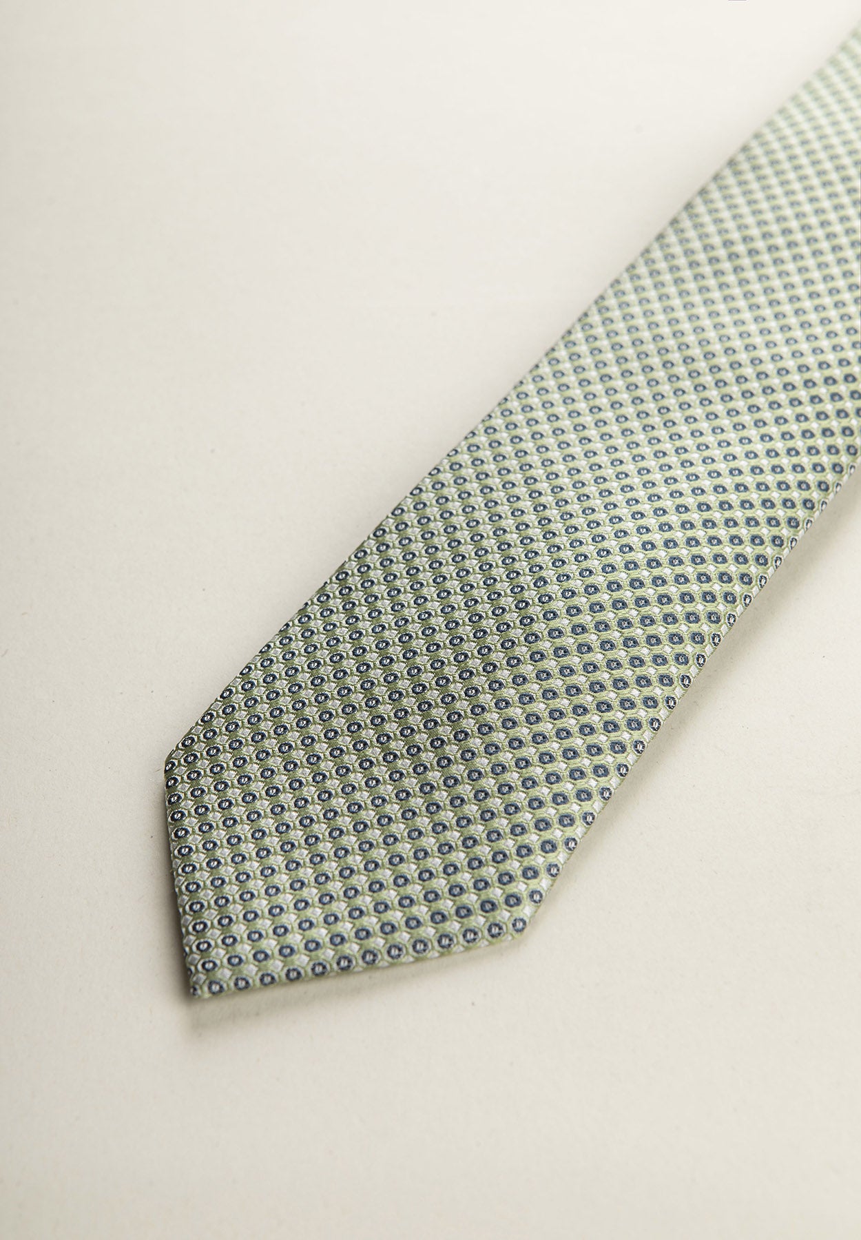 Greenish tie with micro pattern, white and blue, silk