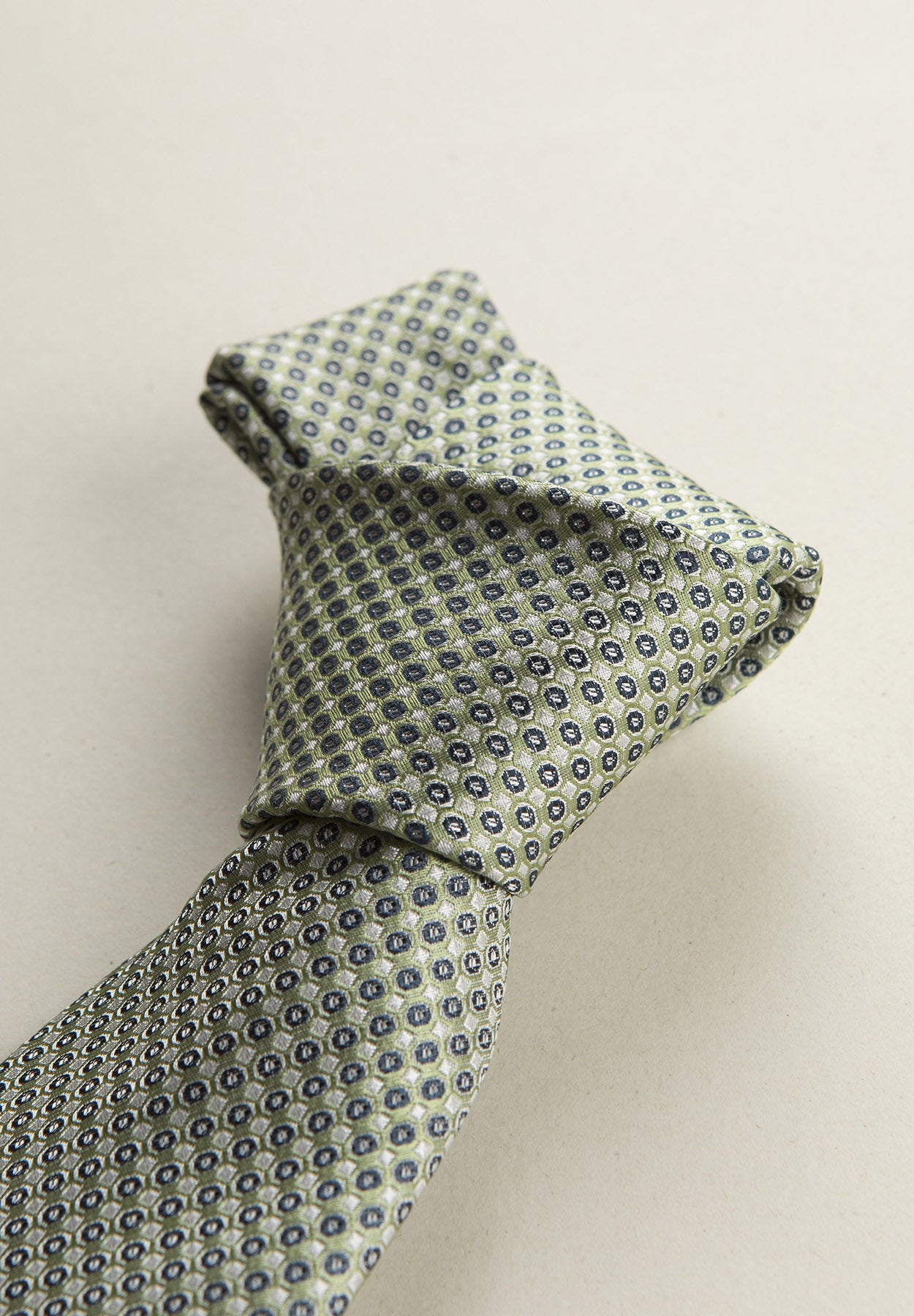 Greenish tie with micro pattern, white and blue, silk