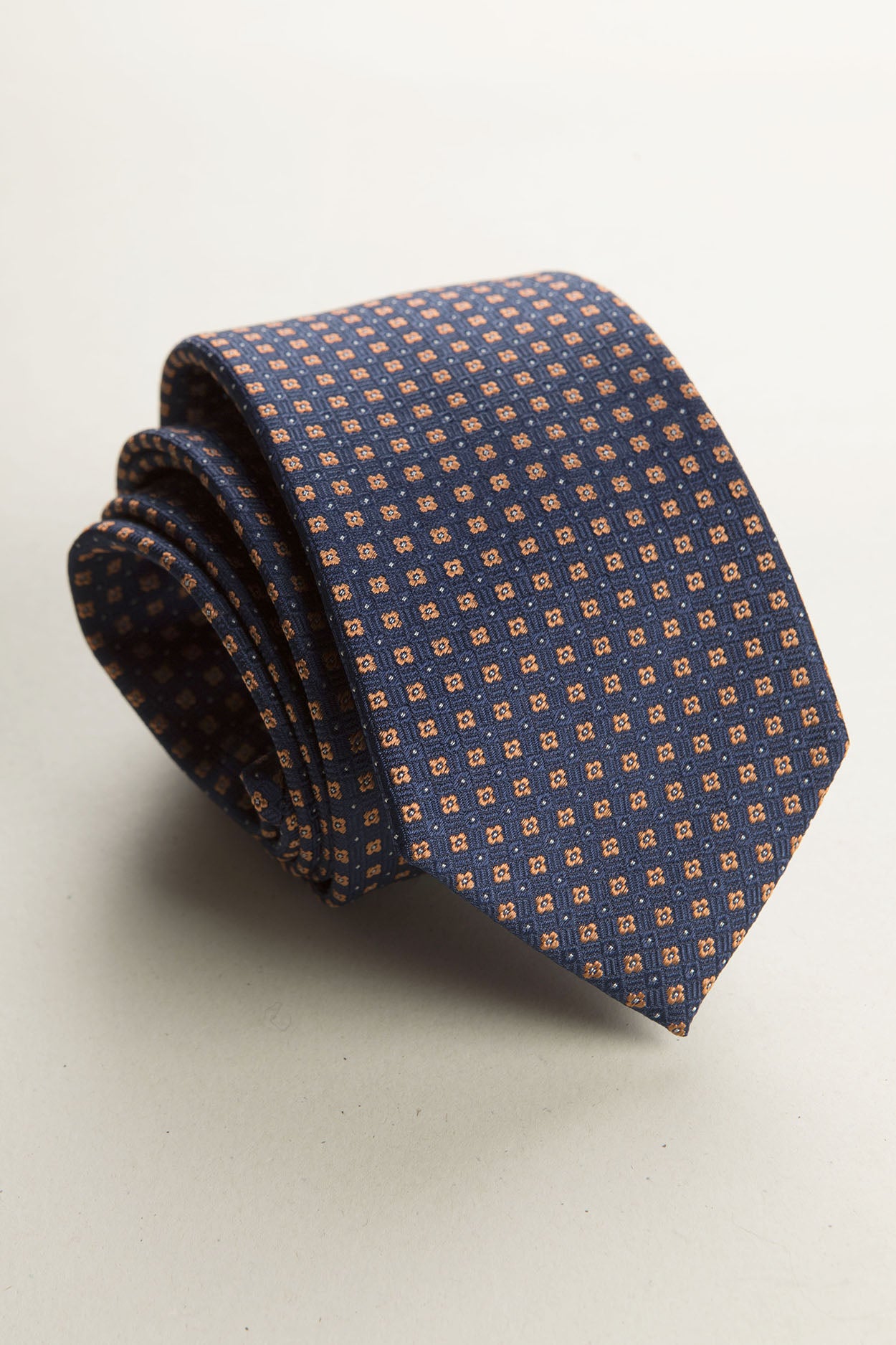 Dark blue tie with orange micro pattern silk