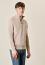 Beige three-button turtleneck in acid-etched cotton