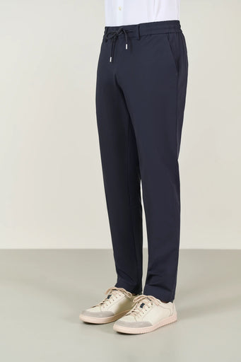 Blue performance fabric trousers with custom fit drawstring 