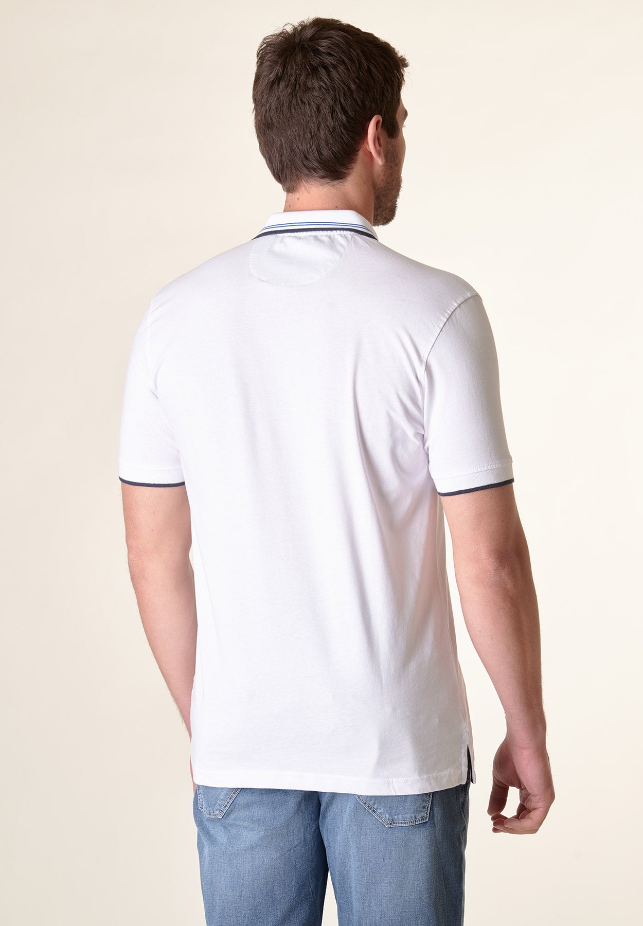 Weißes Poloshirt aus Baumwolljersey mit Streifendetail