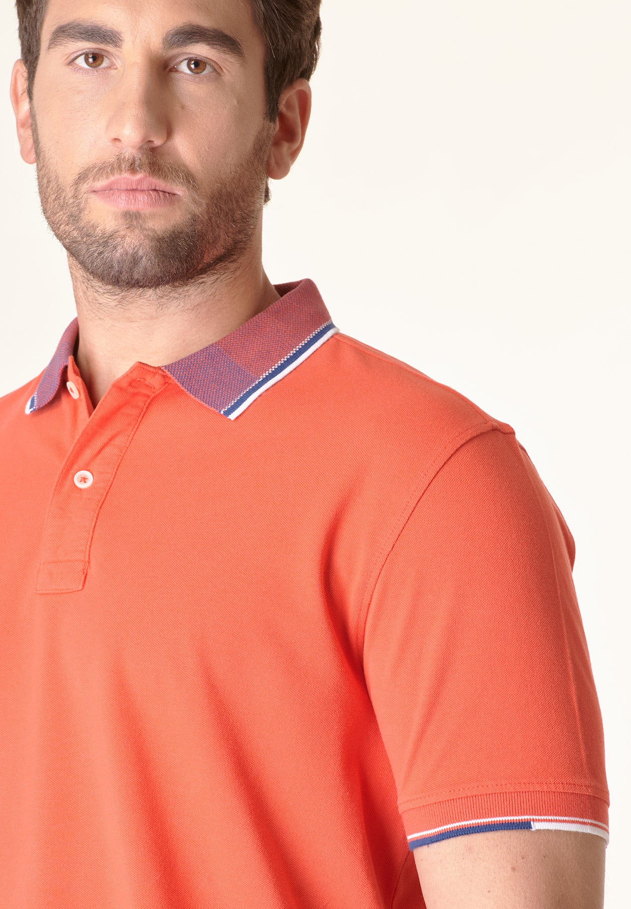 Orangefarbenes Poloshirt aus Baumwolle mit Jacquard-Kragen