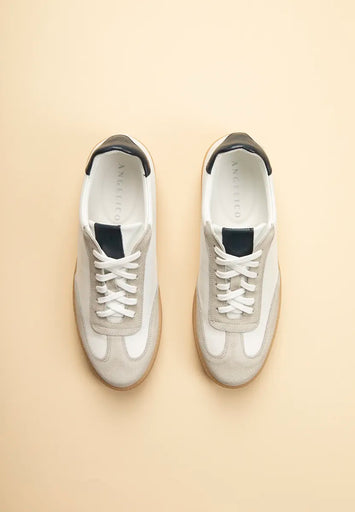 White leather sneaker with suede toe