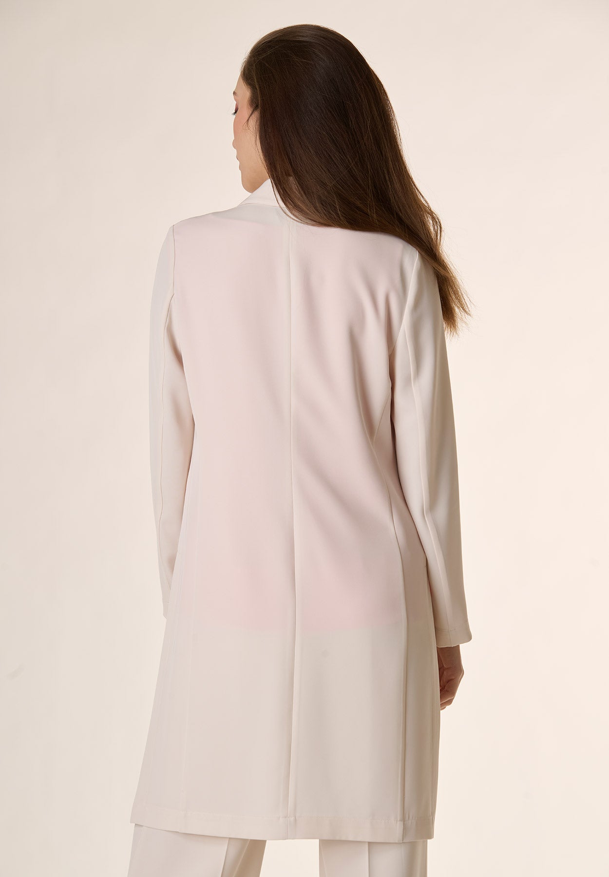 Cream coat with side slits