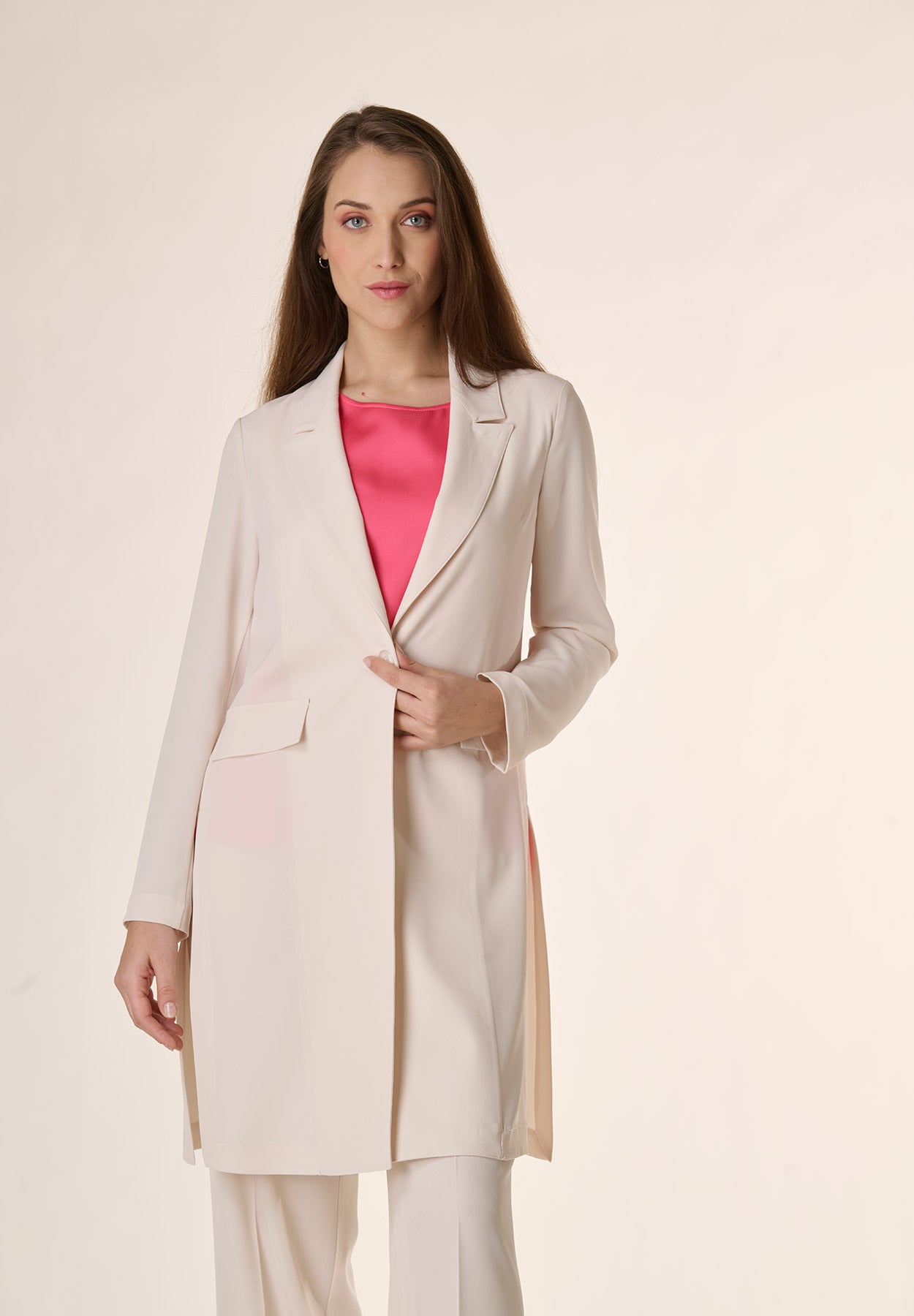 Cream coat with side slits