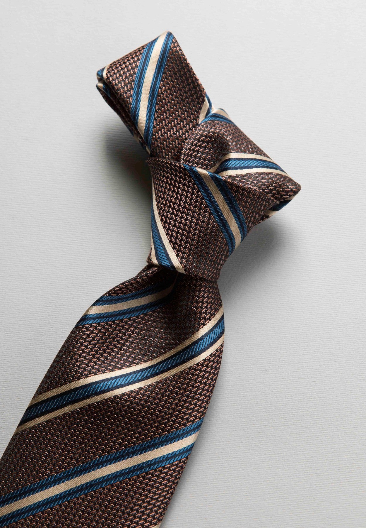 Cravatta rigata bruciato-beige-blu seta